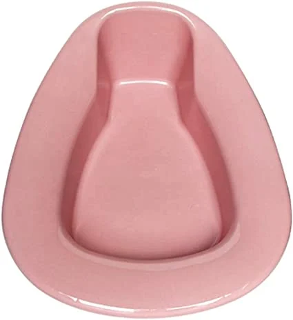 Comfort Axis bedpan with ergonomic design for elderly users