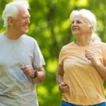 Mature adult engaging in light aerobic routine for fitness