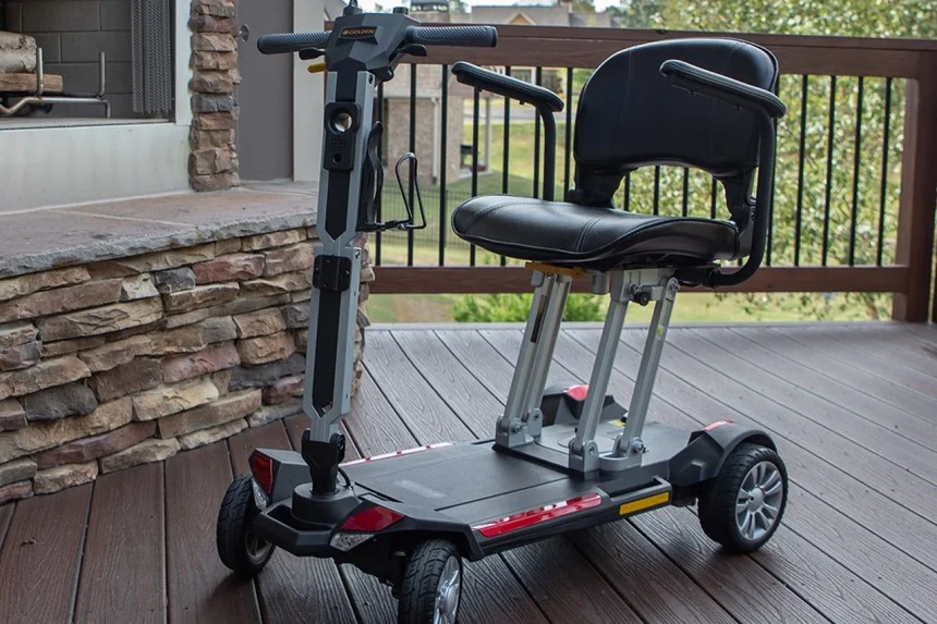 Elderly woman riding the best mobility scooter for seniors in daily life
