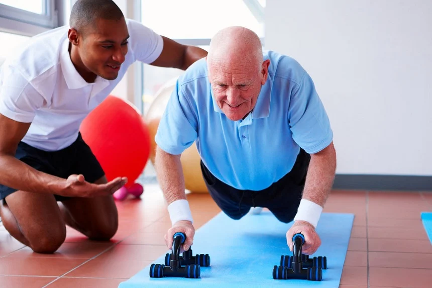 Senior individuals engaging in safe gym exercises to maintain fitness