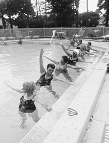 Seniors preparing for water aerobics or hydrotherapy session