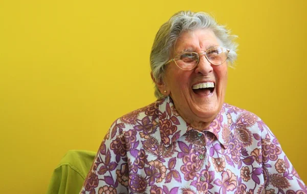 happy senior celebrating international day of the older person