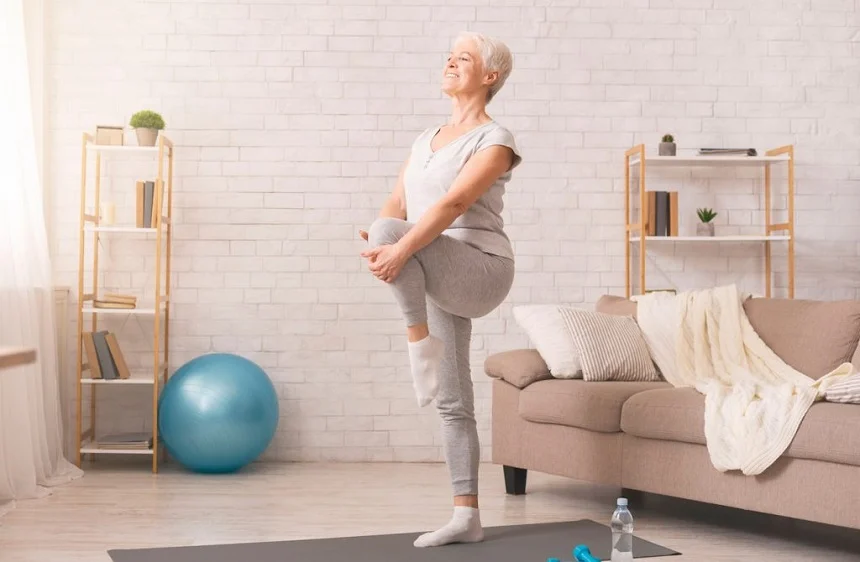 Senior practicing yoga poses to improve balance and stability